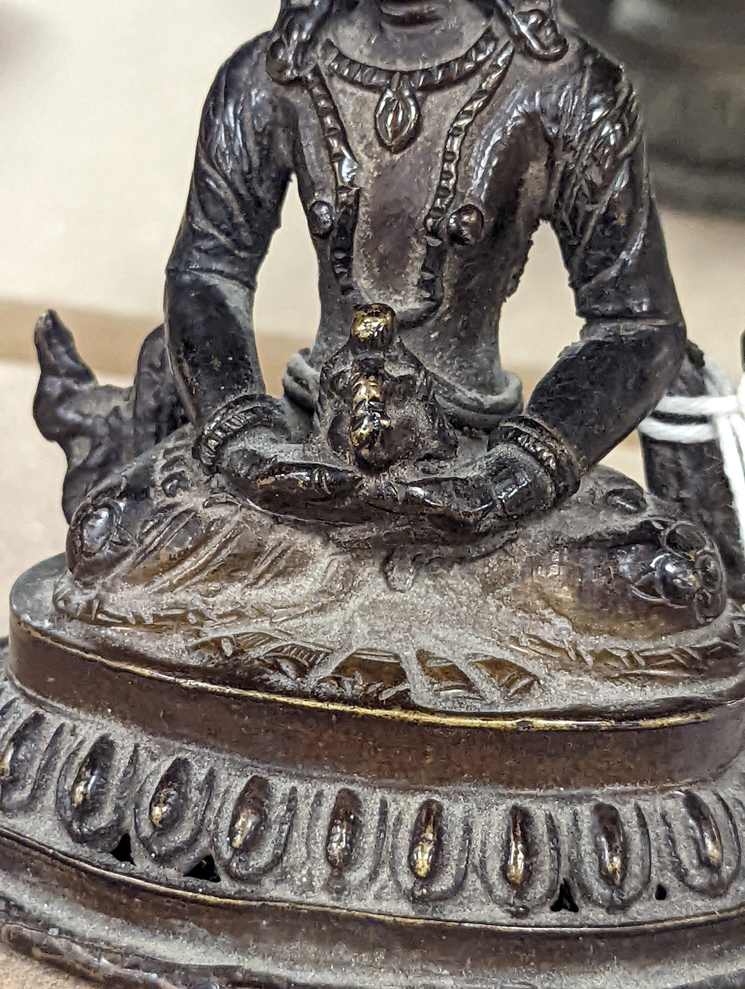 A 19th/20th century Himalayan bronze buddha 12cm